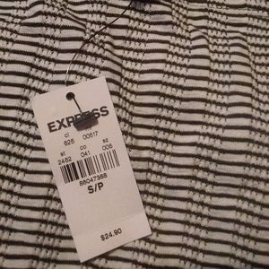 A black & white quarter length sleeved shirt